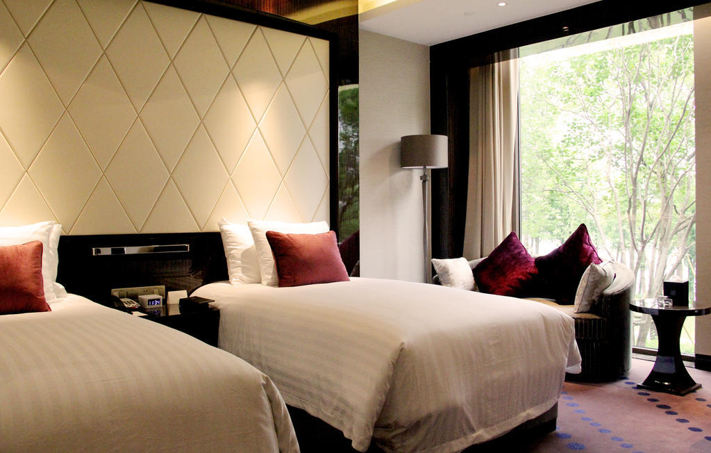 New Century Grand Hotel Nanxun Huzhou Quarto foto